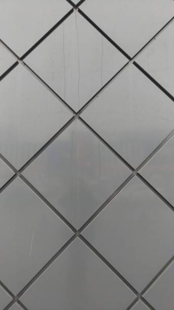 istock The exterior of the building - cladding with metal diamond sheets 1295534044