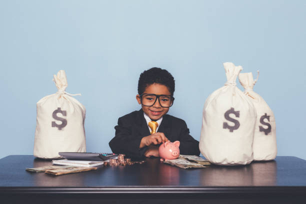 istock Young Business Boy Making Money 1295534813
