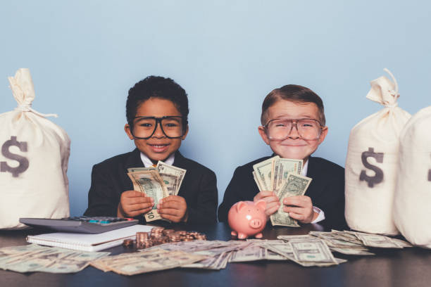 istock Young Business Boys Making Money 1295534816