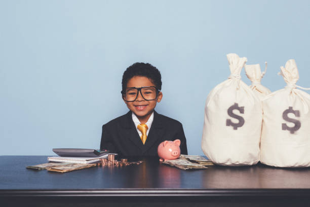 istock Young Business Boy Making Money 1295534822