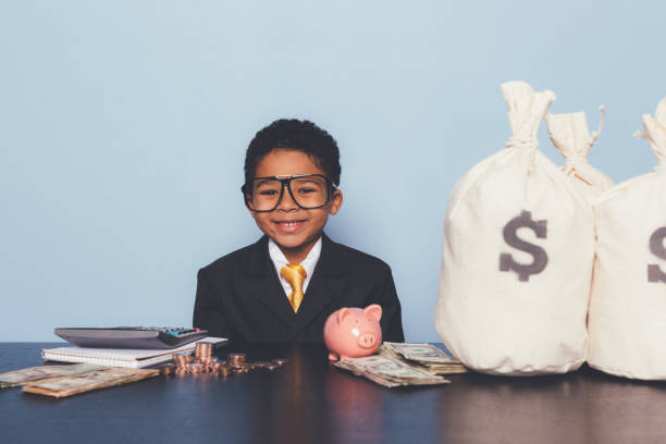 istock Young Business Boy Making Money 1295534823