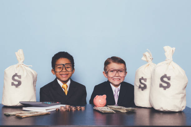 istock Young Business Boys Making Money 1295534824