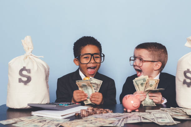 istock Young Business Boys Making Money 1295534825