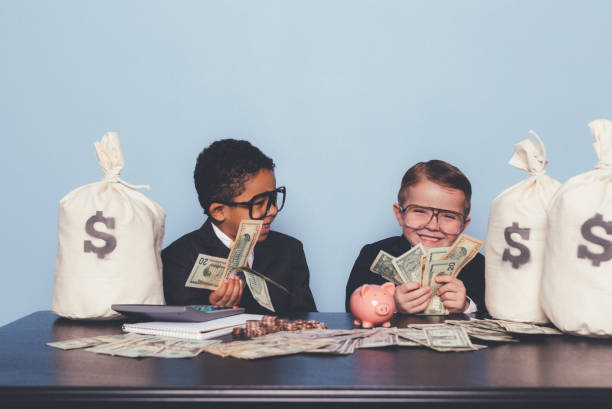 istock Young Business Boys Making Money 1295534828
