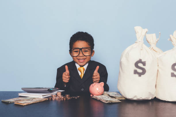 istock Young Business Boy Making Money 1295534831