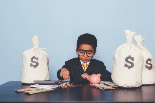 istock Young Business Boy Making Money 1295534835