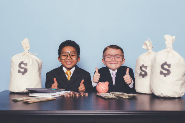 istock Young Business Boys Making Money 1295534844