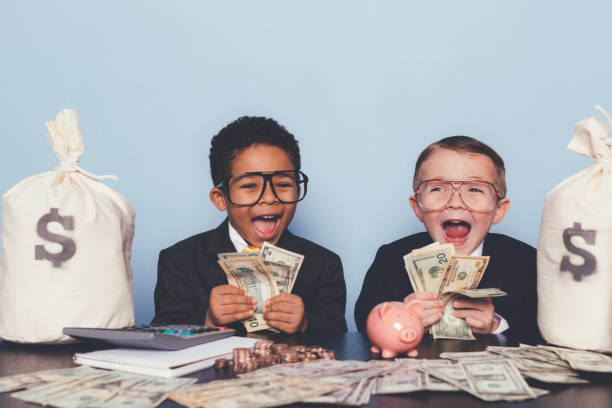 istock Young Business Boys Making Money 1295534854