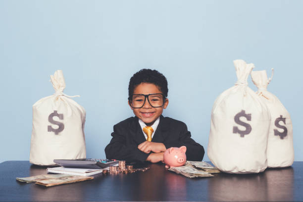 istock Young Business Boy Making Money 1295534857