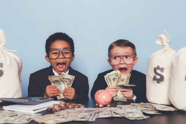 istock Young Business Boys Making Money 1295534861