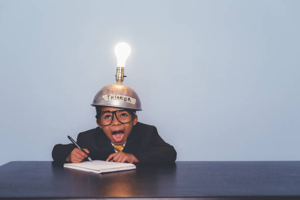 istock Young Business Boy Finding Big Ideas 1295534869