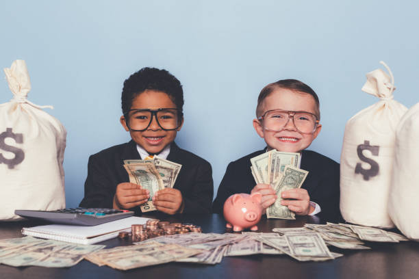 istock Young Business Boys Making Money 1295538554