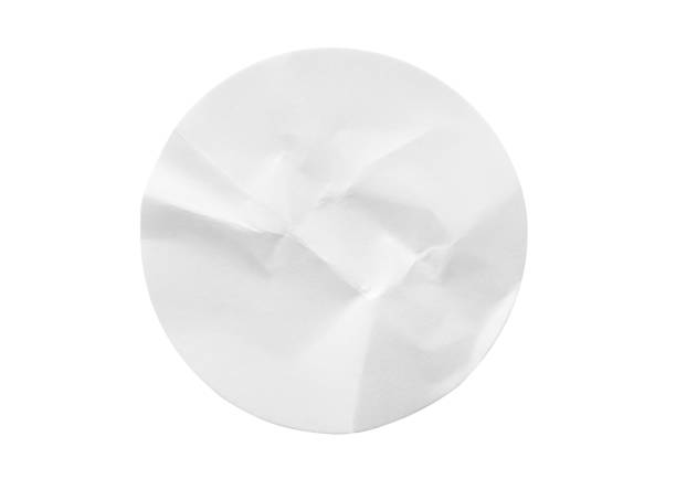 istock Blank white round paper sticker label isolated on white background 1295540167