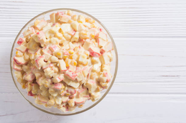 istock Salad with crab sticks , corn , eggs and mayonnaise 1295541344