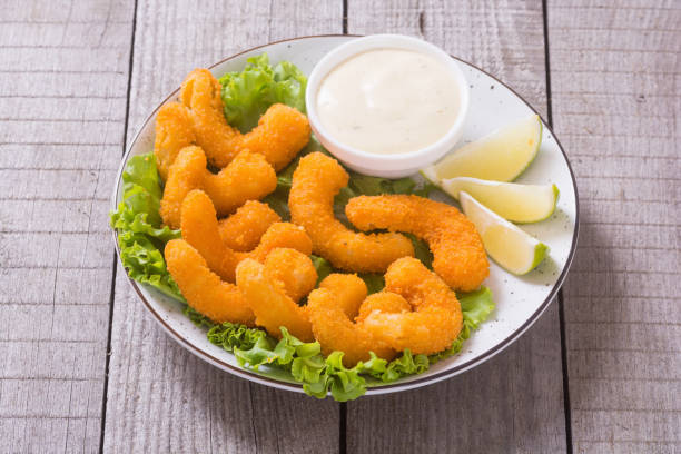 istock Shrimps in batter with sauce and lime 1295541345