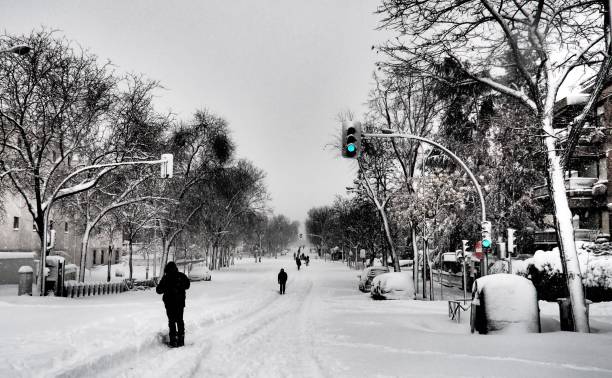 istock Serrano street covered by snow in Madrid 1295541748