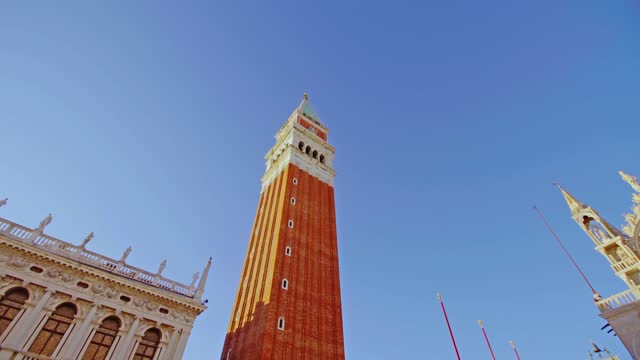 Picturesque St Mark Basilica and Campanile on empty square