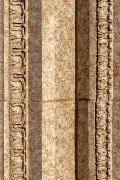 istock Beautiful beige vintage marble wall with intricate moulding 1295553258