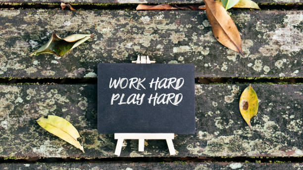 istock Life quotes - Work Hard Play Hard 1295554024