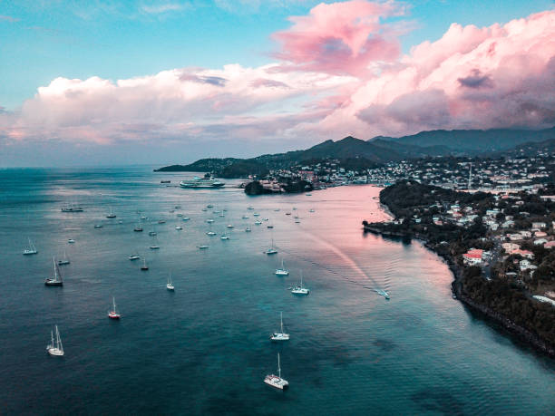 Pink Sky and Sail Boats Saint George, Grenada grenada stock pictures, royalty-free photos & images