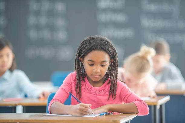 istock African American girl in elementary classroom 1295555631