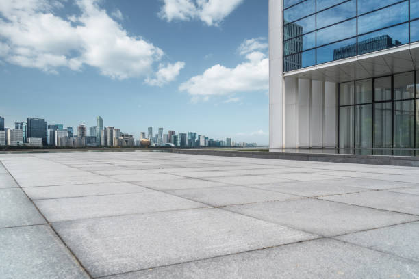 istock Abstract building wall with city skyline background 1295563704