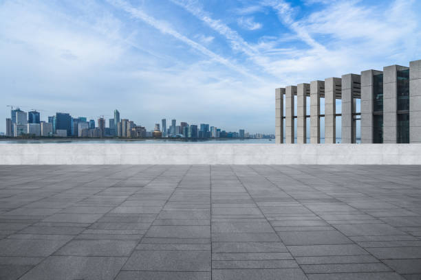 istock Abstract building wall with city skyline background 1295564221