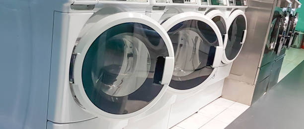 istock laundry shop wahs machines  empty open doors 1295565384