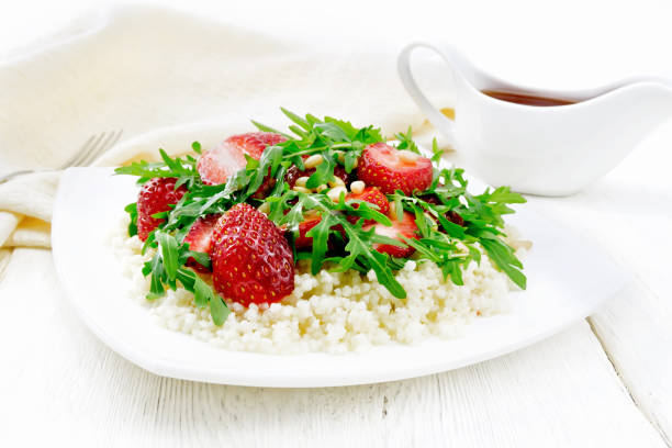 salad of strawberry and couscous on light board - cedrine imagens e fotografias de stock