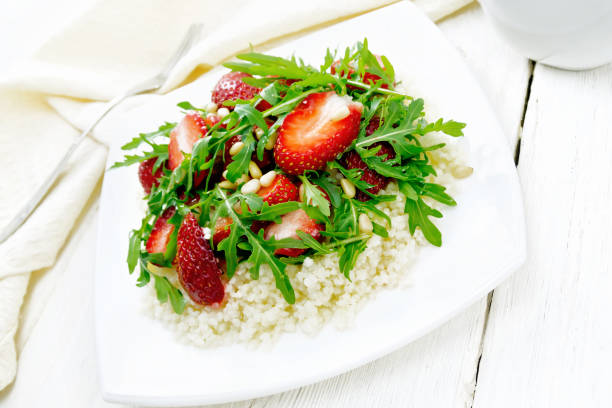 salad of strawberry and couscous on board - cedrine imagens e fotografias de stock