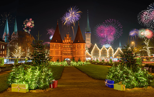 Nighttime view of Holsten Gate at Christmas time. Christmas tree with gifts.Christmas city.
