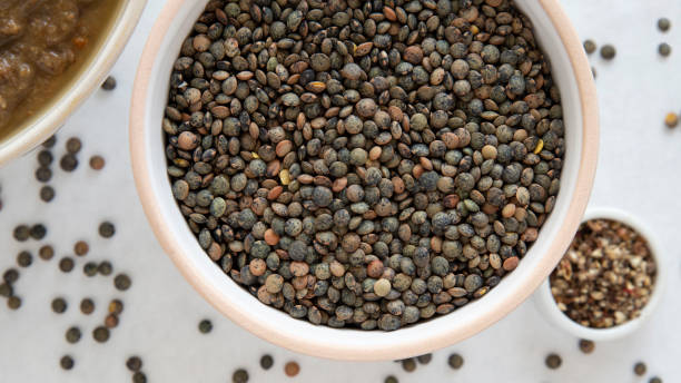 istock Bowl of raw lentils 1295578019