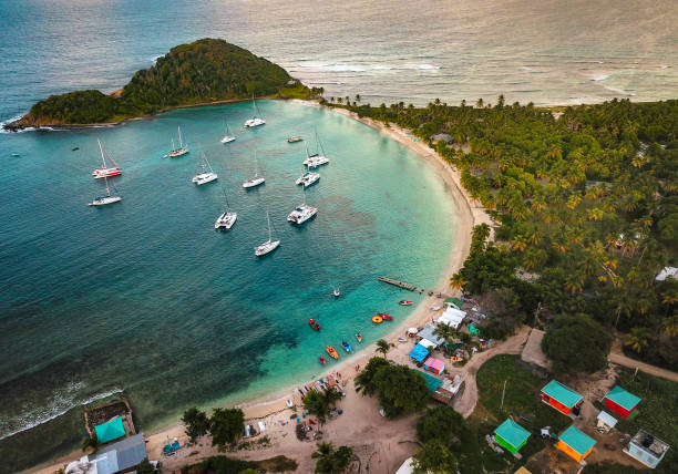 The Caribbean island of Mayreau Saint Vincent and The Grenadines flag of saint vincent and the grenadines stock pictures, royalty-free photos & images