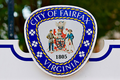 Fairfax, Virginia / USA - July 3, 2017: Close-up, City of Fairfax coat of arms on a sign in historic Old Town Fairfax.