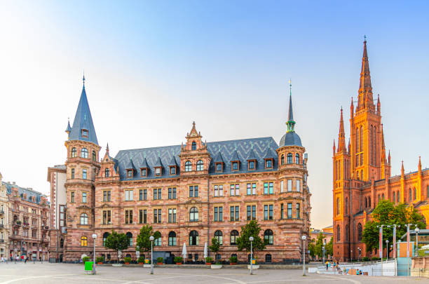 Wiesbaden cityscape with City Palace Stadtschloss or New Town Hall Rathaus and Evangelical Market Protestant church stock photo