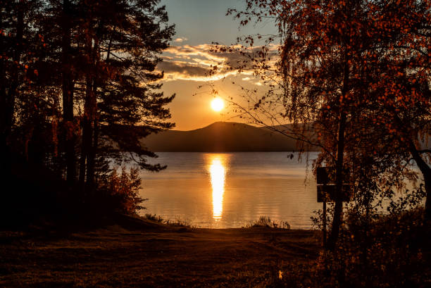 istock Scenic sunset on a beautiful lake in autumn 1295584354