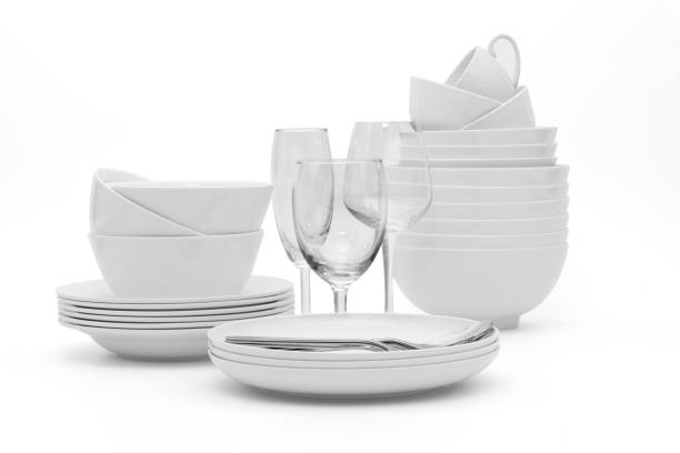 istock set clean dishes glasses on white background 1295585430