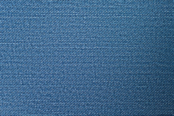 blue jeans fabric texture closeup stock photo