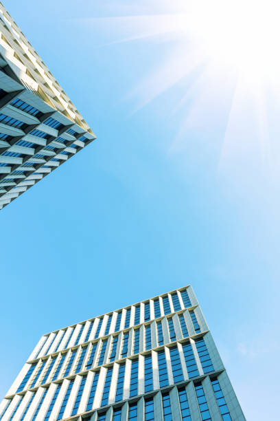 istock Office building in the blue sky 1295596611