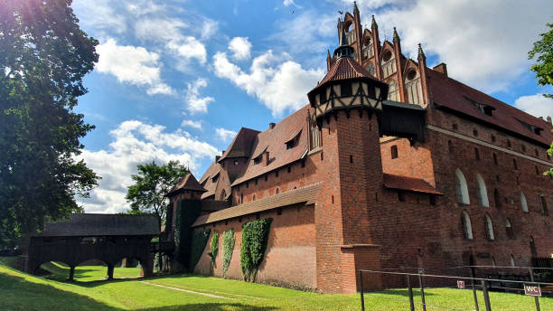 Walls of the Teutonic Castle in Malbork, Poland Malbork, Poland - July 25, 2020: Walls of the Teutonic Castle in Malbork, Poland malbork photos stock pictures, royalty-free photos & images