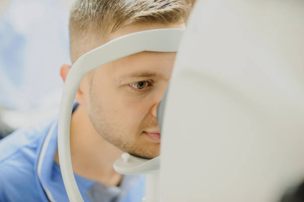 istock close up head of young patient fix in Tomography in Optical Coherence 1295603298