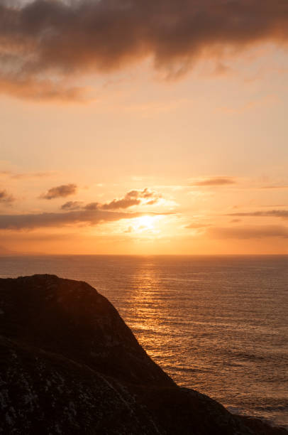 istock Beautiful sunset at cape Oyambre 1295603948