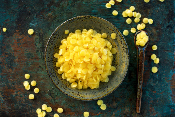 istock yellow natural beeswax 1295605357