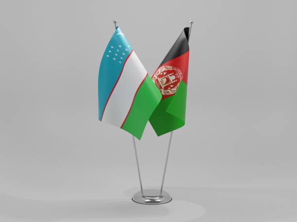 istock Afghanistan - Uzbekistan Cooperation Flags, White Background - 3D Render 1295607304