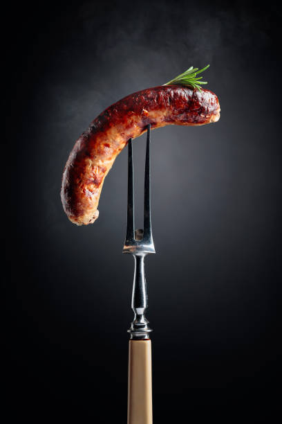 istock Grilled Bavarian sausage with rosemary. 1295607392