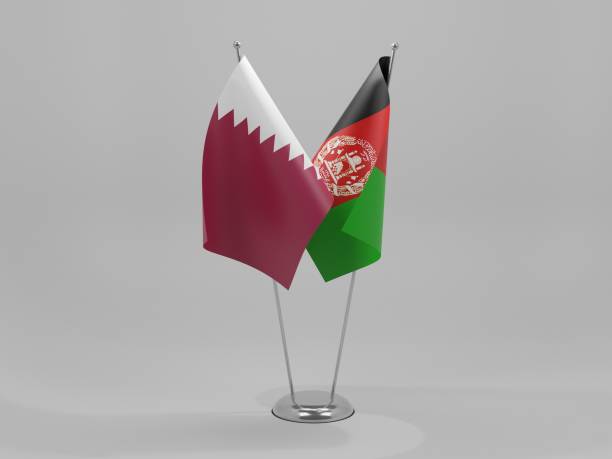 istock Afghanistan - Qatar Cooperation Flags, White Background - 3D Render 1295608119