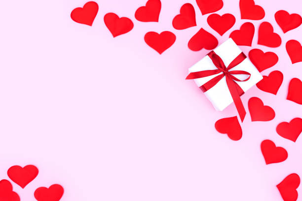 istock Background with gift and hearts with free space for text on pastel pink background. Flat lay, top view. Valentines day concept. Mother's Day concept. 1295608129