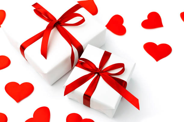 istock Background with gift and hearts with copy space for text on white background. Valentines day concept. Mother's Day concept. 1295608135