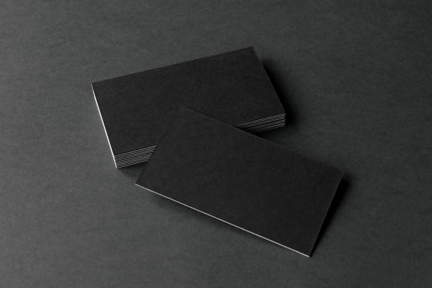 Business card on black background. Business cards blank. Mockup on black background. Copy space for text. print ad mockup stock pictures, royalty-free photos & images