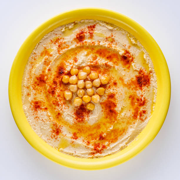 istock traditional turkish hummus on a white acrylic background 1295609350